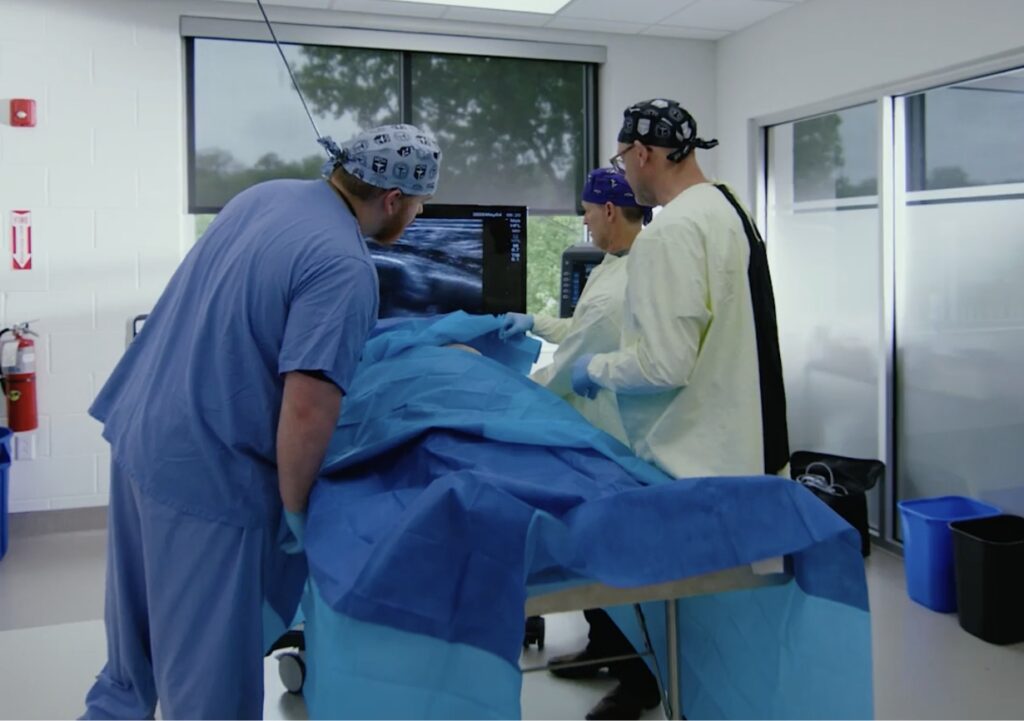 Students practicing skills in the cadaver lab