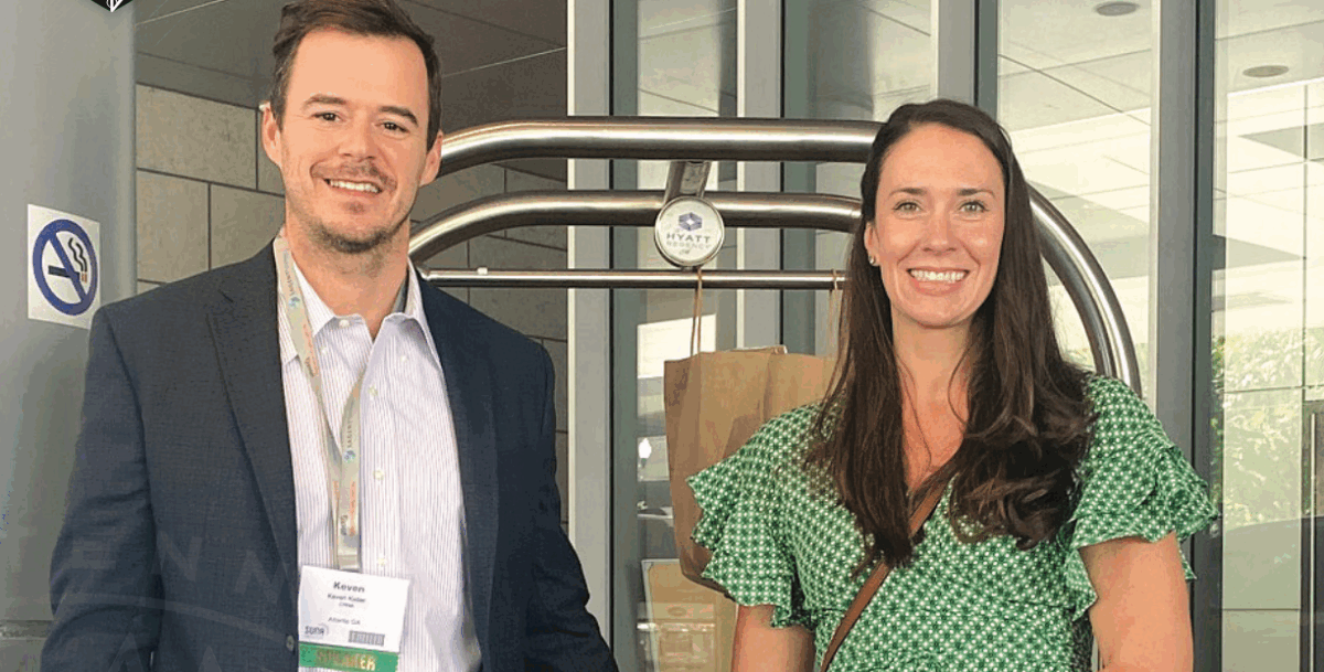 Two individuals smiling